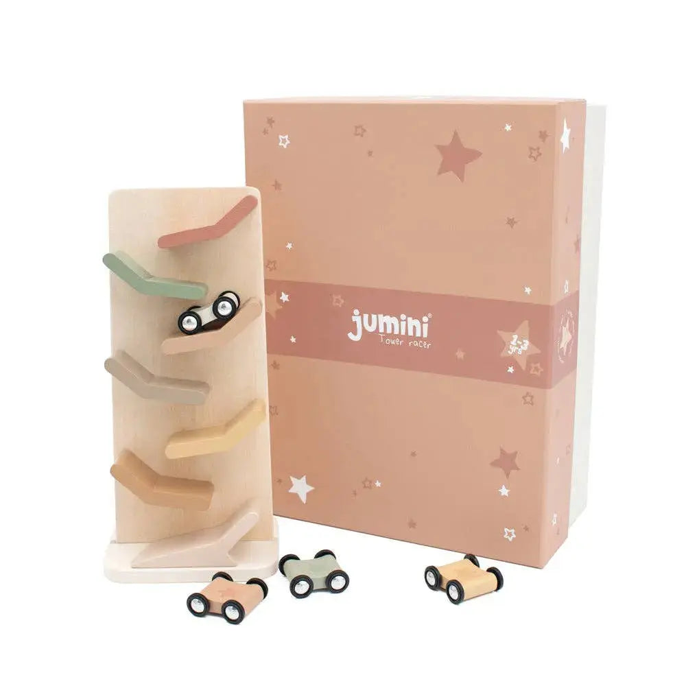Wooden tower racer with accessories in front of a 'jumini' branded box on a white background