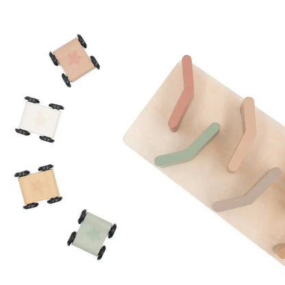 Set of colourful wooden toys on a white background