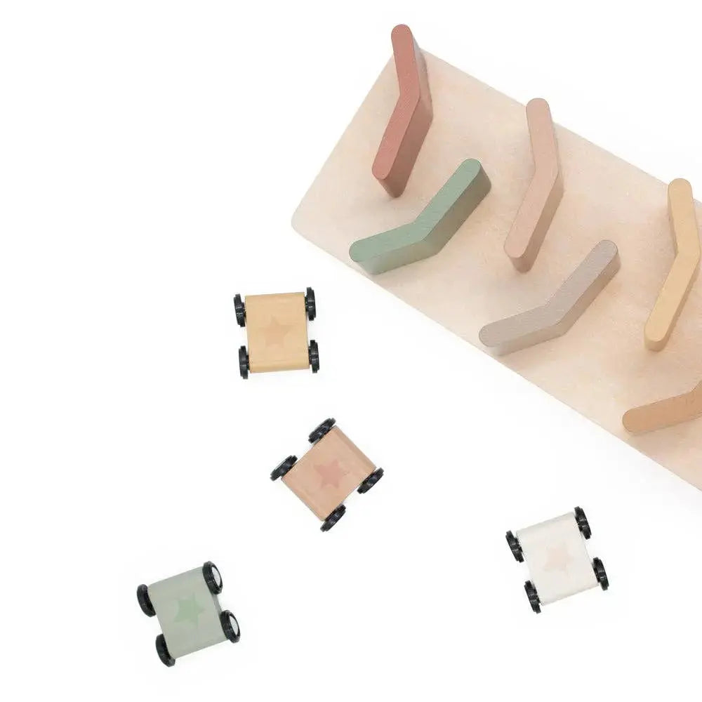 Set of colourful wooden cars on a white background