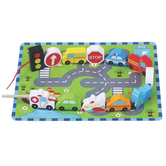 Toy traffic lacing game with vehicles and traffic signs on a white background