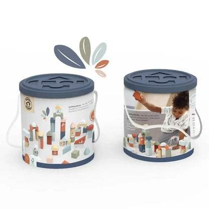 Two containers with lids, one featuring cityscape design and the other with a child playing with blocks, on a white background.