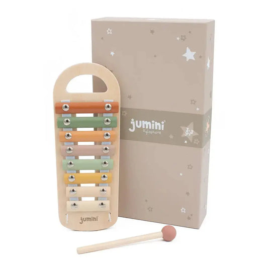 Wooden xylophone toy with colourful bars and a wooden mallet, next to its packaging box featuring the 'jumini' brand.