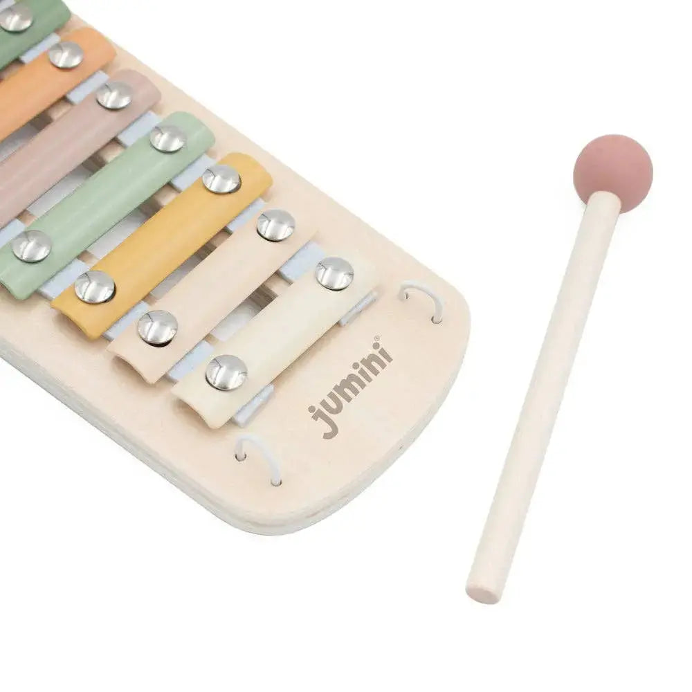 Wooden xylophone with colourful keys and a mallet on a white background, featuring the brand 'jumini'.